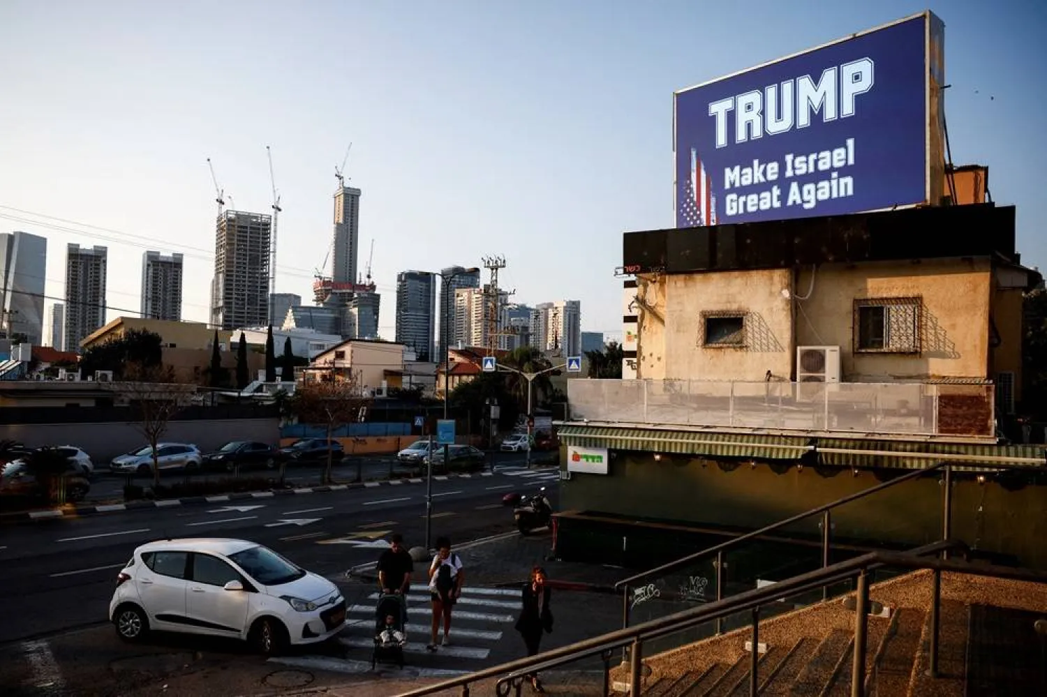 A billboard shows a slogan in support of Republican presidential nominee and former US President Donald Trump, on the day of 2024 US presidential election, in Tel Aviv, Israel, November 5, 2024. (Reuters)