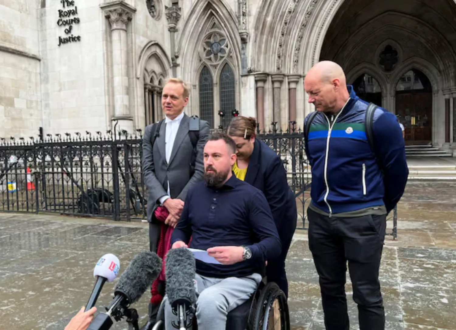 Martin Hibbert, who was paralysed in the Manchester Arena bombing in 2017, speaks to media outside the Royal Courts of Justice after the trial of his lawsuit against Richard D. Hall for alleged harassment, in London, Britain July 25, 2024. REUTERS/Sam Tobin/File Photo