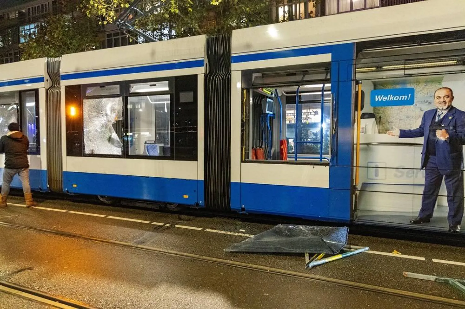 The windows of a tram are seen shattered after riots in Amsterdam, Netherlands, November 11, 2024. (Mizzle Media/Handout via Reuters)