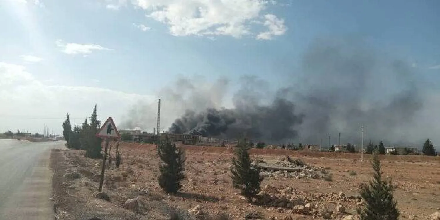 سحابة دخان تظهر بالقرب من القصير غرب سوريا (سانا)