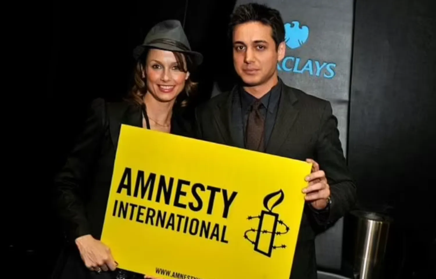 Actress Bridget Moynahan (L) and activist Kianoosh Sanjari at an Amnesty International Concert in New York - AFP