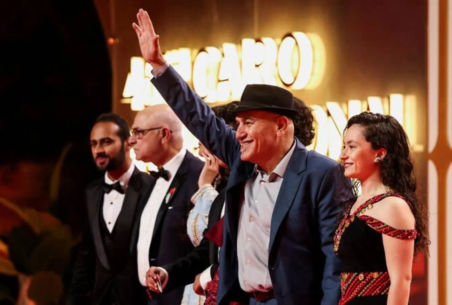 Palestinian director Rashid Masharawi (2nd R) presented his film 'Passing Dreams' at the Cairo International Film Festival this week. Khaled DESOUKI / AFP
