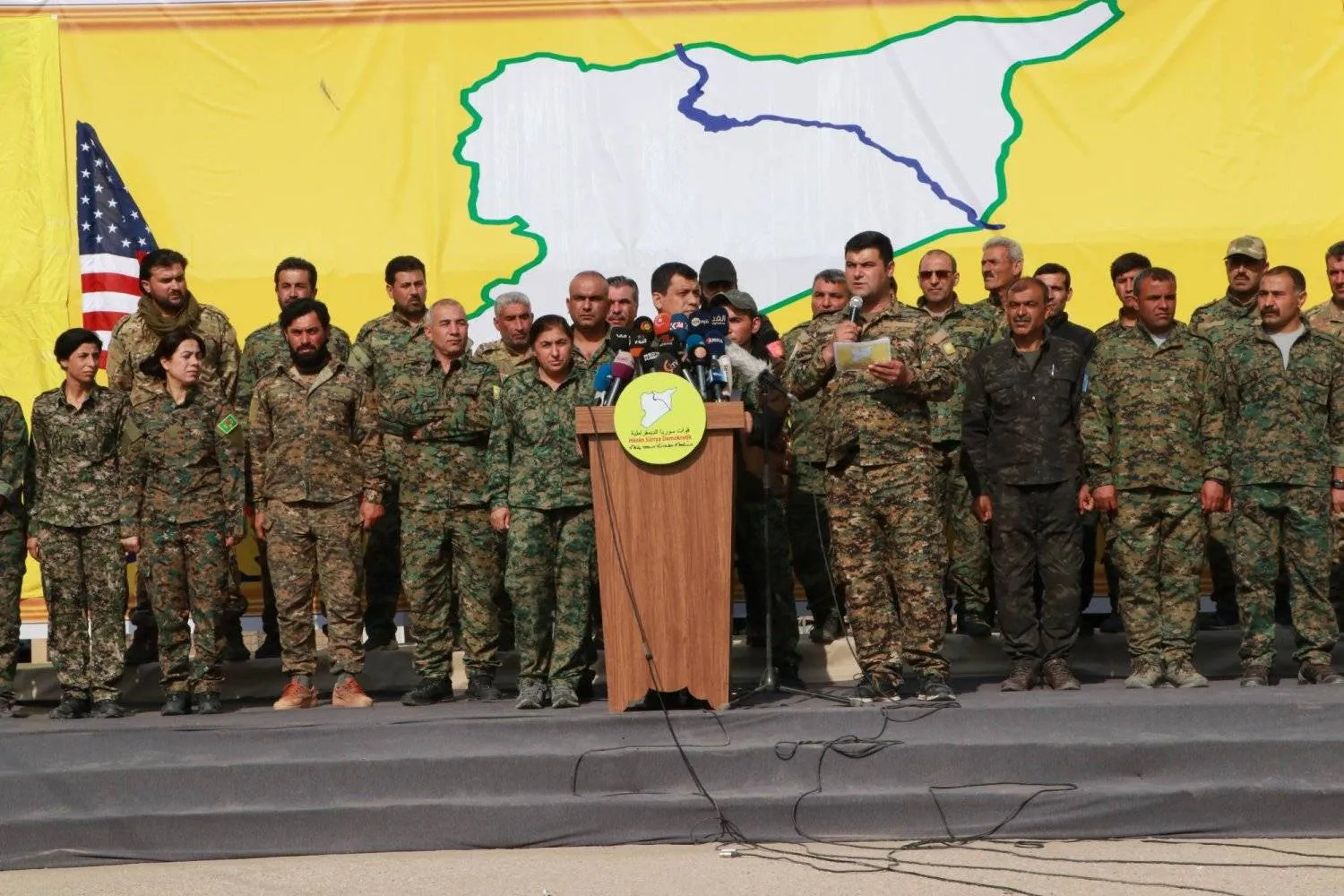 The Syrian Democratic Forces (SDF) during a military parade in the Deir ez-Zor countryside (Asharq Al-Awsat)