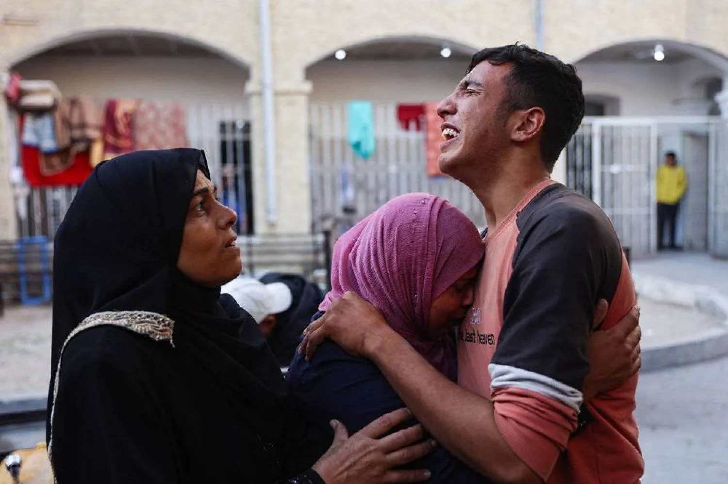 Relatives mourn the death of Atef Al-Atout, a Palestinian man who his family said was shot dead as he fled Beit Lahia in the northern Gaza Strip toward in Gaza City, in front of the al-Maamadani hospital on November 6, 2024. (AFP)
