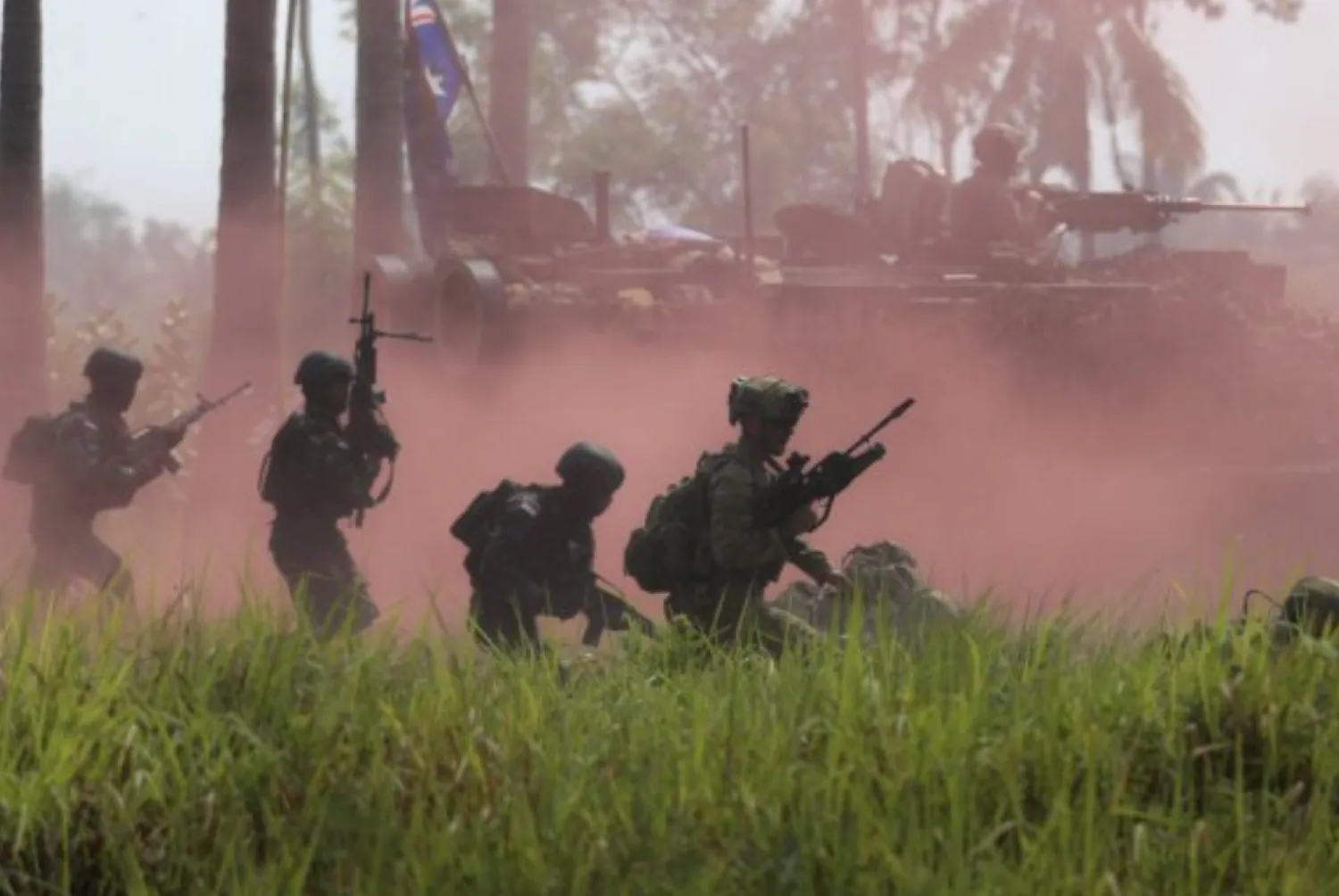 Australian soldiers and Indonesian marines conduct a maneuver during a joint amphibious landing exercise on Banongan Beach, Situbondo, Indonesia, Wednesday, Nov. 13, 2024. (Fle/AP Photo/Trisnadi)
