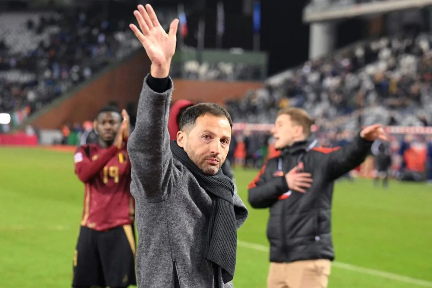  Belgium's head coach Domenico Tedesco waves at the end of the UEFA Nations League Group A2 football match between Belgium and Italy at the King Baudouin Stadium in Brussels on November 14, 2024. (AFP) 
