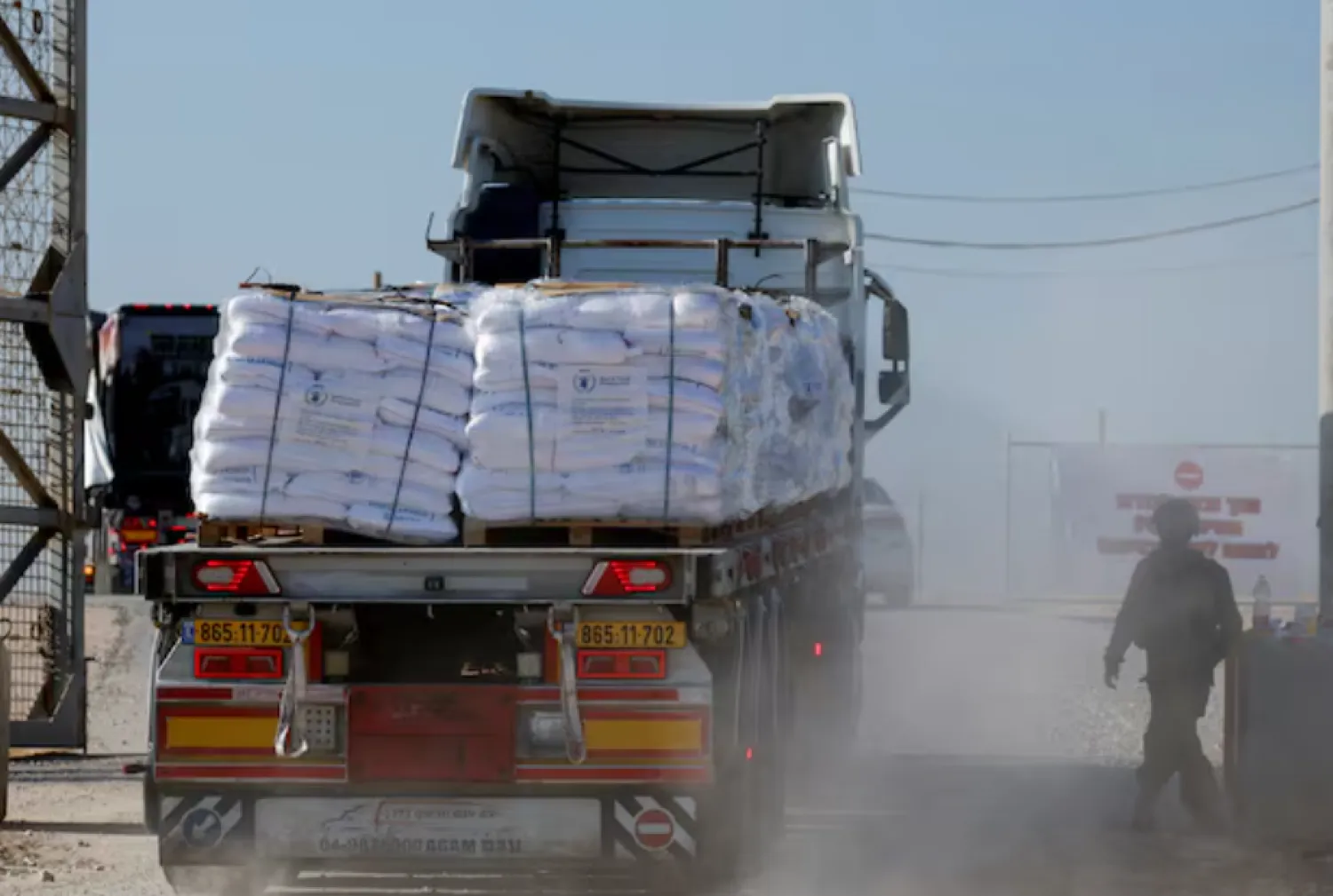 A truck carries humanitarian aid destined for the Gaza Strip, amid the ongoing conflict in Gaza between Israel and Hamas, at the Kerem Shalom crossing in southern Israel, November 11, 2024. REUTERS/Amir Cohen/File Photo