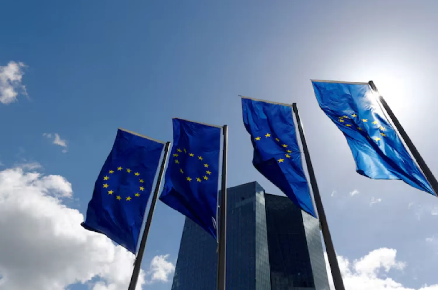 European Union flags flutter outside the European Central Bank headquarters in Frankfurt, Germany, April 26, 2018. REUTERS/Kai Pfaffenbach/File Photo 
