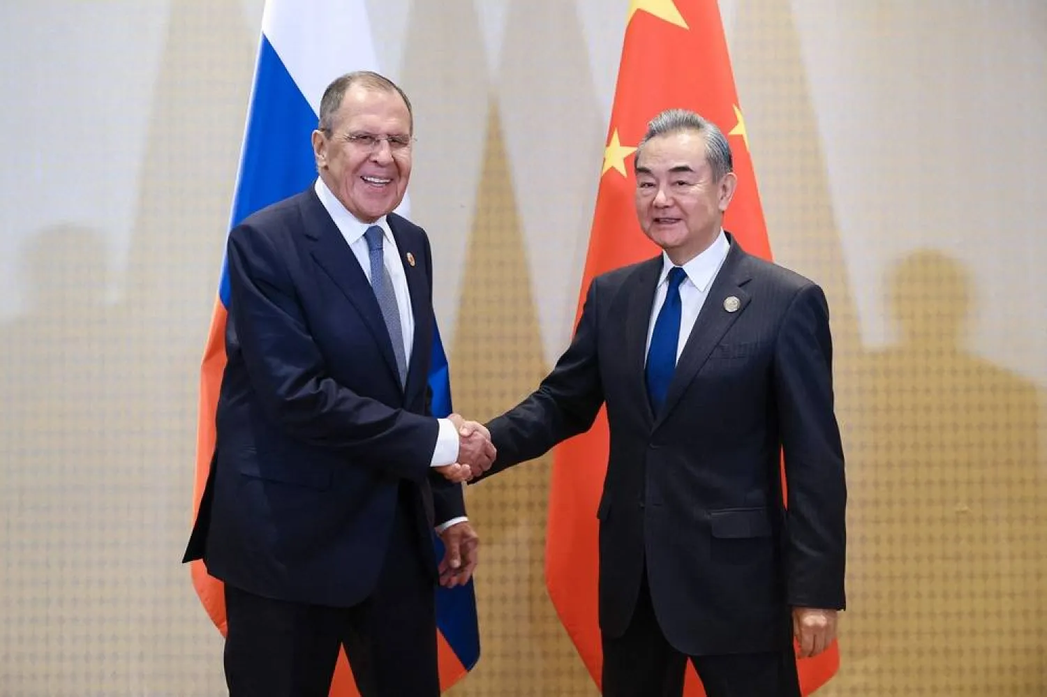 In this handout picture released by the Russian Foreign Ministry on November 19, 2024, Russian Foreign Minister Sergei Lavrov meets with Chinese Foreign Minister Wang Yi on the sidelines of the G20 Summit in Rio de Janeiro, Brazil. (Russian Foreign Ministry/AFP)