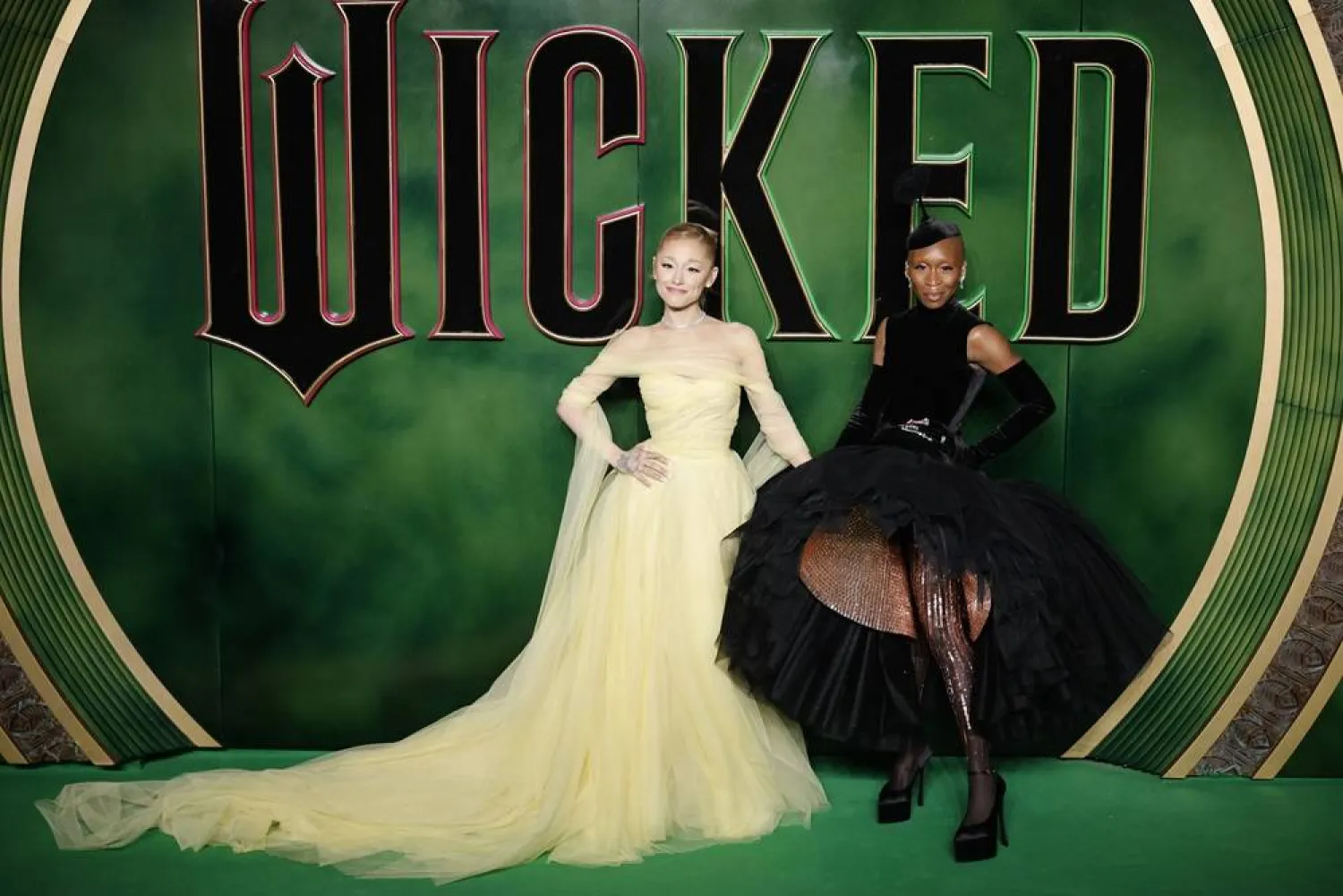 US singer and actor Ariana Grande (L) and British actor and singer Cynthia Erivo (R) on the green carpet at the UK premiere of "'Wicked" at the Royal Festival Hall in London, Britain, 18 November 2024. (EPA)