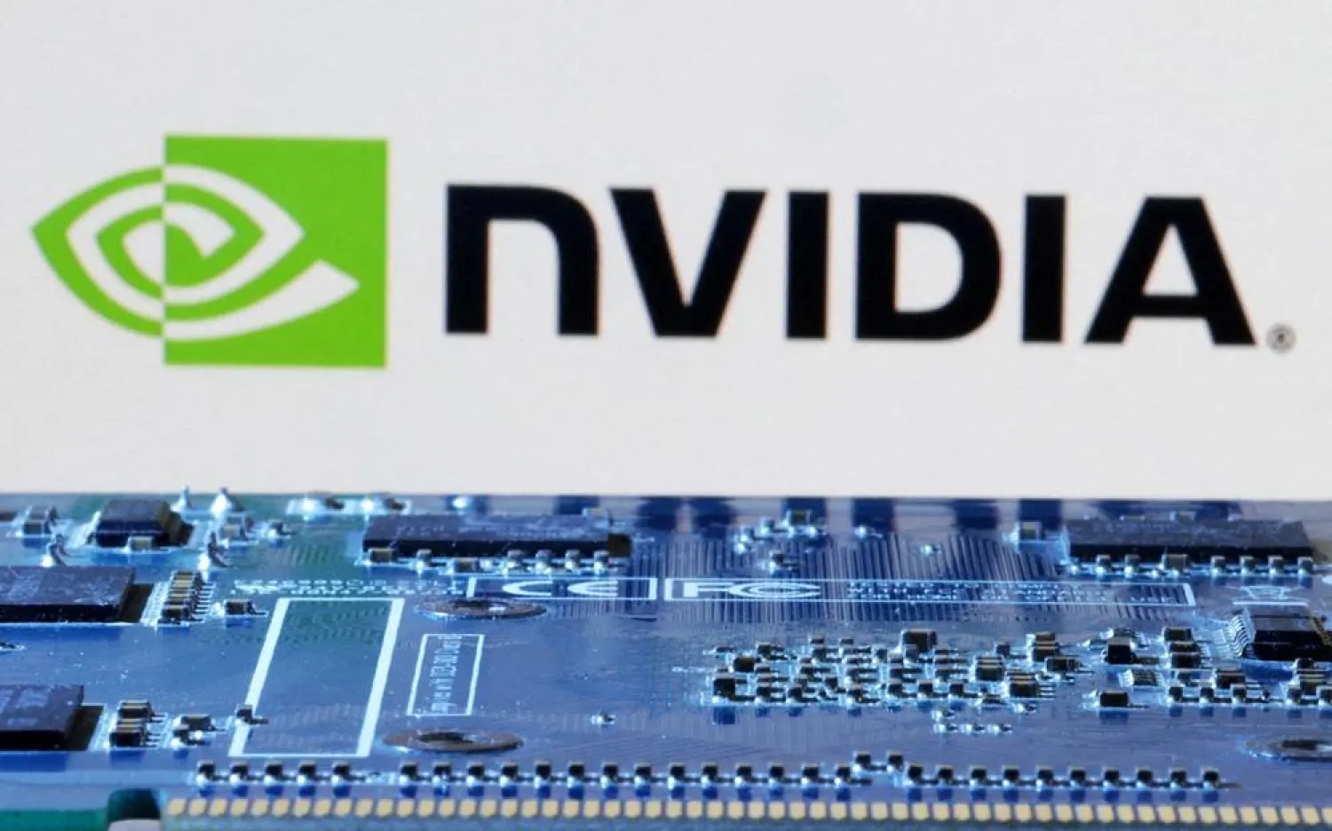 The NVIDIA logo is seen near a computer motherboard in this illustration taken January 8, 2024. (Reuters)