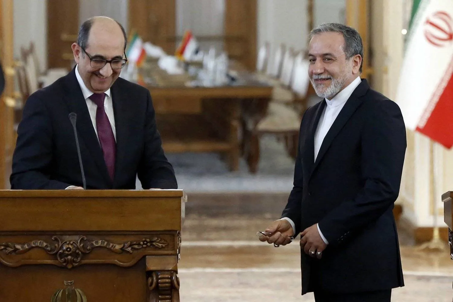 Iranian Foreign Minister Abbas Araghchi and his Syrian counterpart Bassam Sabbagh in Tehran on Tuesday. (AFP) 