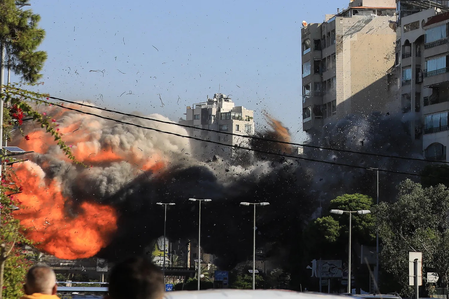 A ball of fire erupts as an Israeli strike hits a building in Beirut's southern Ghobeiri neighborhood on November 15, 2024, amid the ongoing war between Israel and Hezbollah. (Photo by AFP)