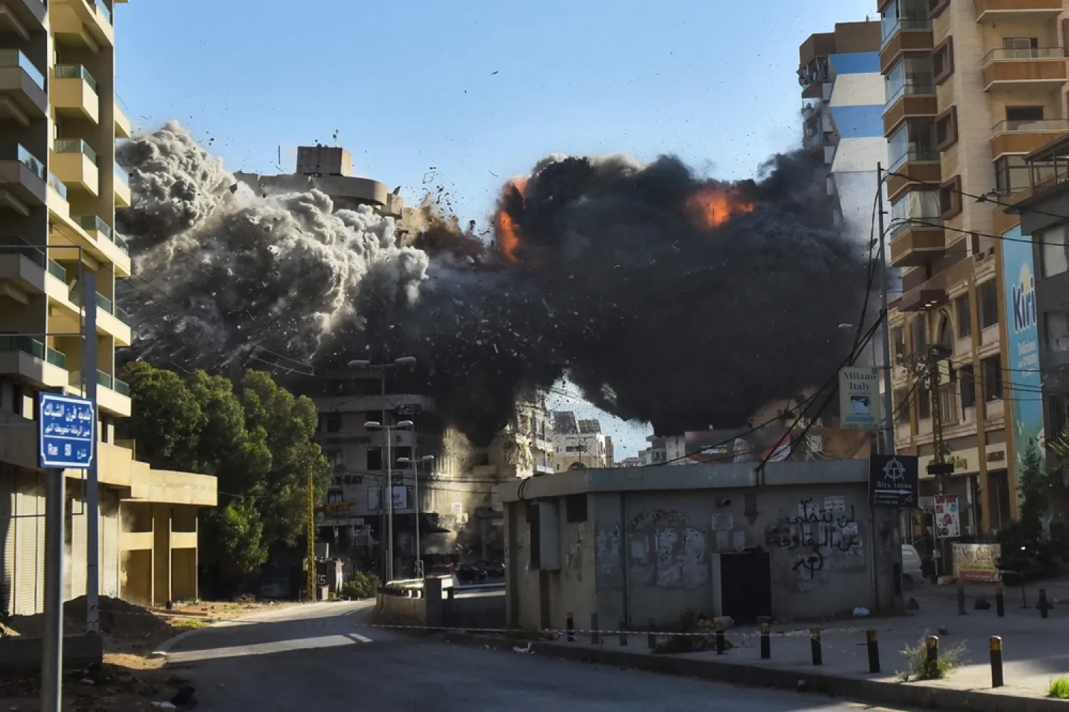 Fire and smoke erupt from a building just after an Israeli airstrike in Beirut's southern Chiyah neighborhood on November 22, 2024, amid the ongoing war between Israel and Hezbollah. (AFP) 