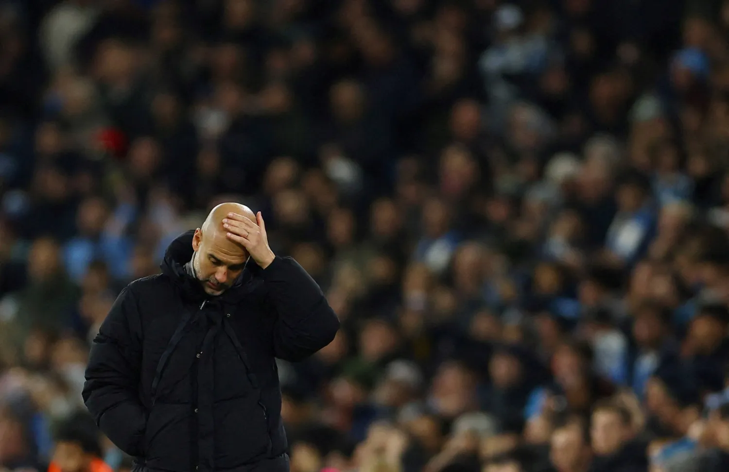 FILE PHOTO: Soccer Football - Champions League - Manchester City v Feyenoord - Etihad Stadium, Manchester, Britain - November 26, 2024 Manchester City manager Pep Guardiola reacts REUTERS/Molly Darlington/File Photo