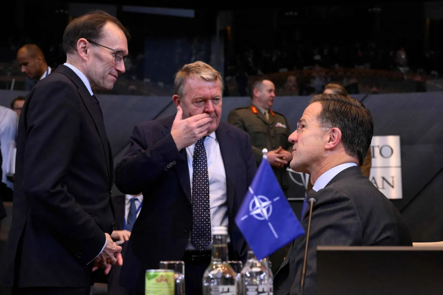 Norway's Foreign Minister Espen Barth Eide (L) talks with Danish's Foreign minister Lars Lokke Rasmussen (C) and Nato Secretary General Mark Rutte (R) during a NATO (North Atlantic Treaty Oganization) Foreign Ministers' meeting at the NATO headquarters in Brussels, on December 4, 2024. (Photo by JOHN THYS / AFP)