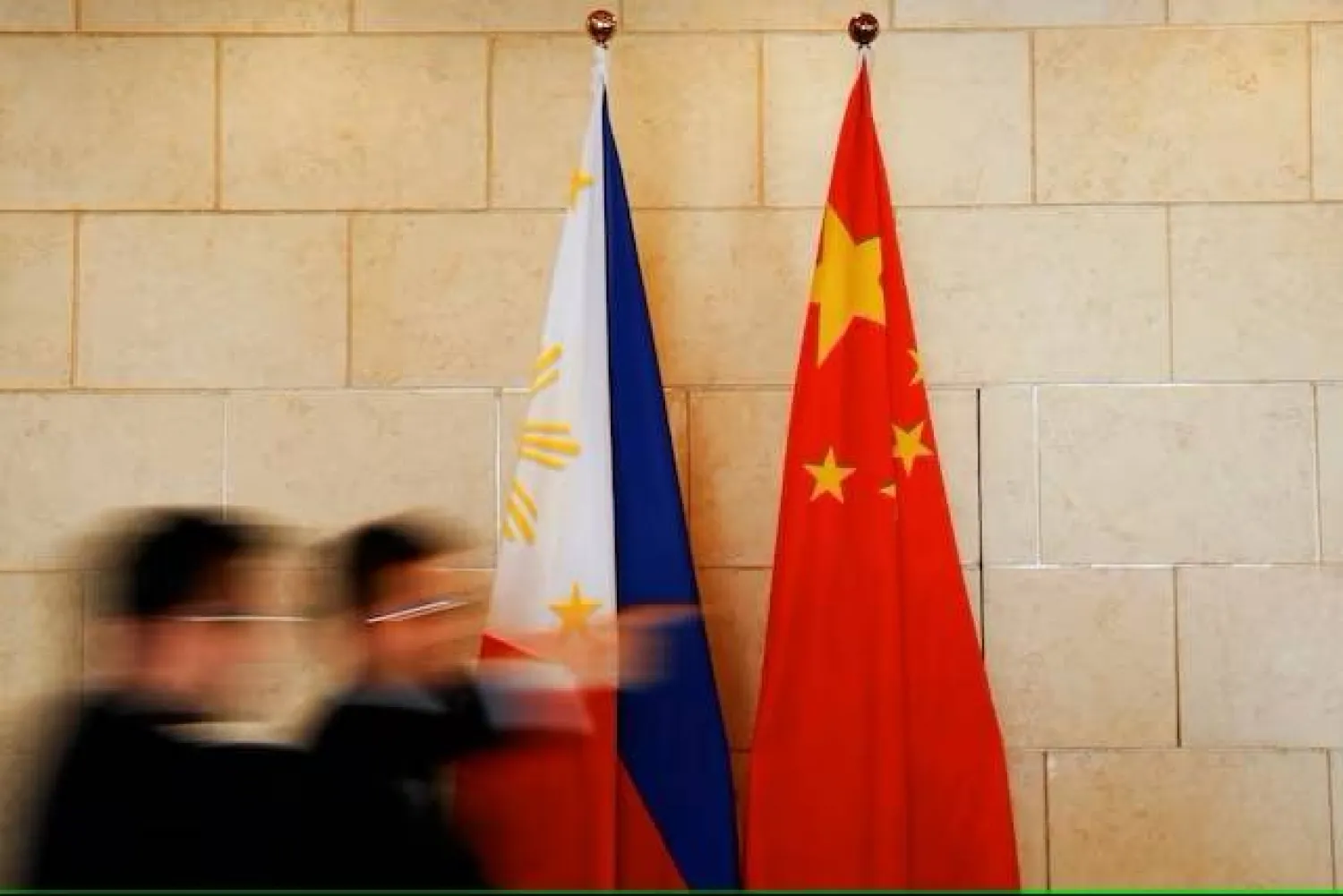 National flags are placed outside a room where Philippine Finance Secretary Carlos Dominguez and China's Commerce Minister Gao Hucheng address reporters after their meeting in Beijing, China, January 23, 2017. REUTERS/Damir Sagolj/File Photo Purchase Licensing Rights
