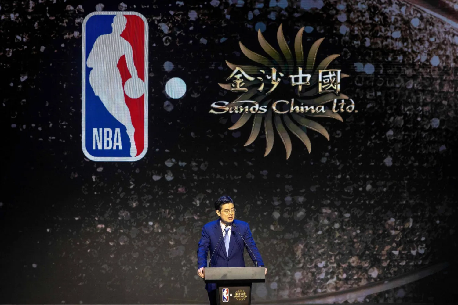Grant Chum, president and CEO of Sands China, speaks during a press conference to announce NBA pre-season games coming to China in 2025, at the Londoner Hotel in Macau on December 6, 2024. (Photo by Eduardo Leal / AFP)