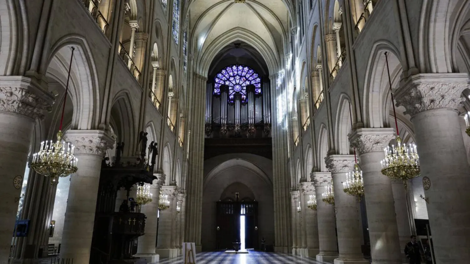 The immense organ has been likened to the 'soul' of Notre Dame. STEPHANE DE SAKUTIN / POOL/AFP
