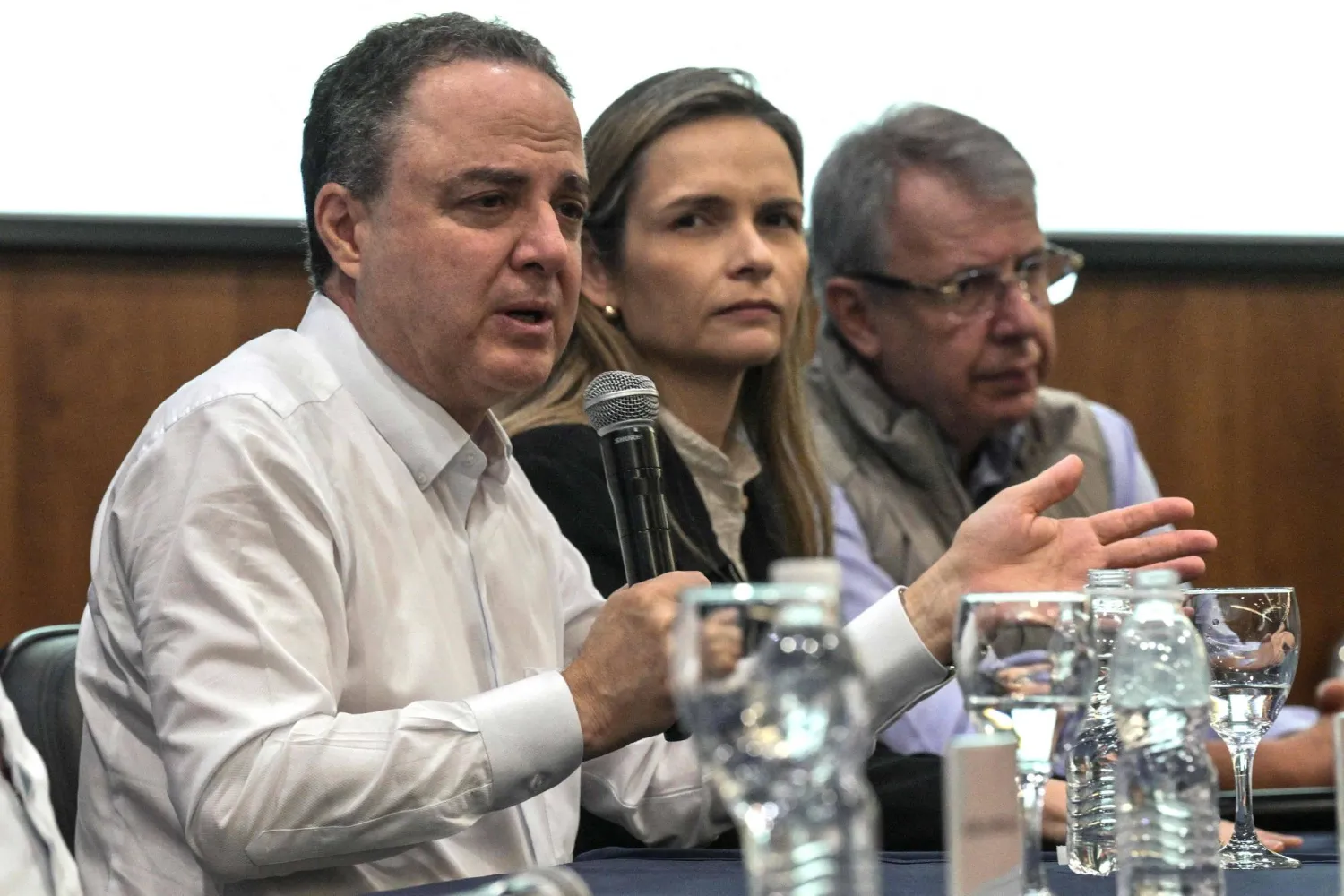 Dr Roberto Kalil (L) speaks next to Dr Ana Helena Germoglio (C) and Dr Marcos Stavale during a press conference at the Syrian-Lebanese Hospital where Brazil's President Luiz Inacio Lula da Silva is hospitalized in Sao Paulo, Brazil, on December 12, 2024. (Photo by Nelson ALMEIDA / AFP)