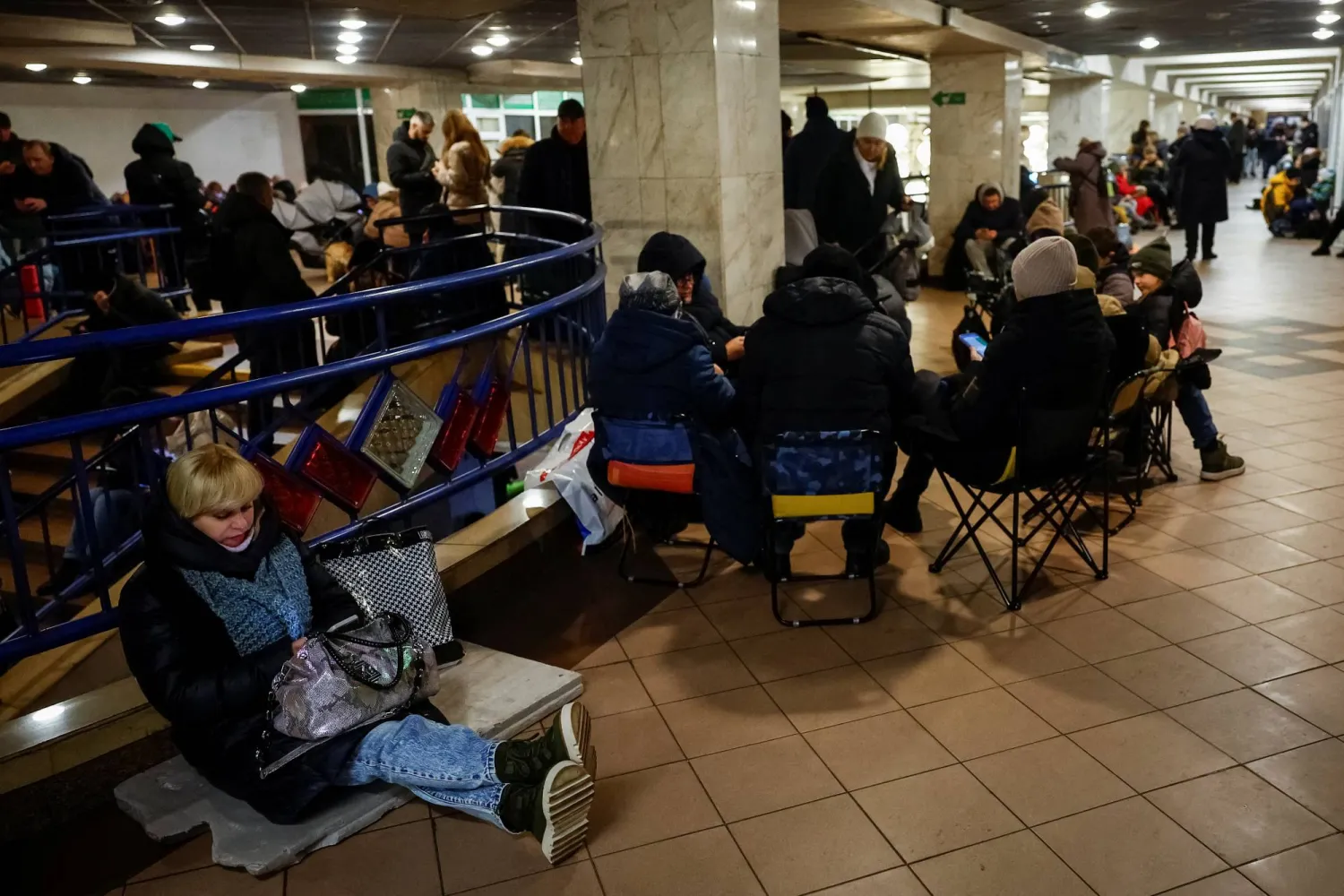 People take shelter inside a metro station during a Russian military strike, amid Russia's attack on Ukraine, in Kyiv, Ukraine December 13, 2024. REUTERS/Alina Smutko