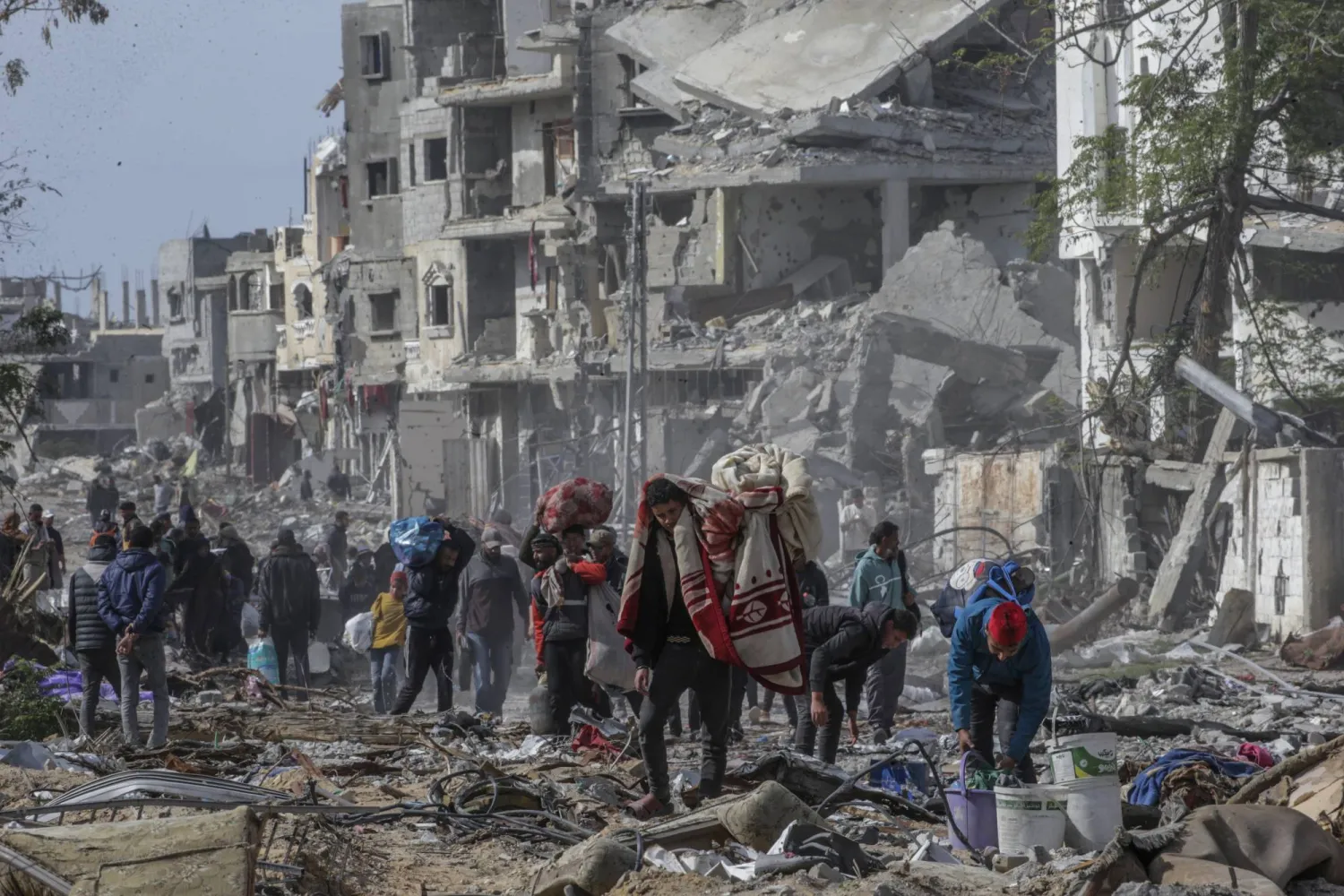 وسط دمار هائل... سكان غزة يبدأون العودة إلى أطلال منازلهم (صور) | الشرق  الأوسط