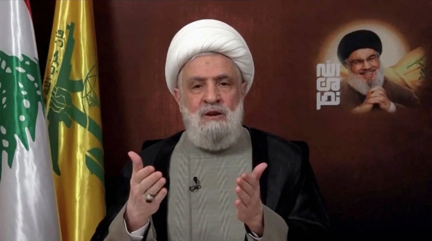 الأمين العام لجماعة «حزب الله» اللبناني نعيم قاسم يُلقي خطاباً من مكان غير معروف 29 نوفمبر 2024 في هذه الصورة المأخوذة من فيديو (رويترز)