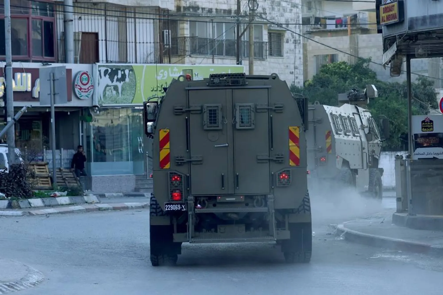 Israeli troops patrol in the Nur Shams refugee camp, near the West Bank city of Tulkarem, 27 January 2025. (EPA)