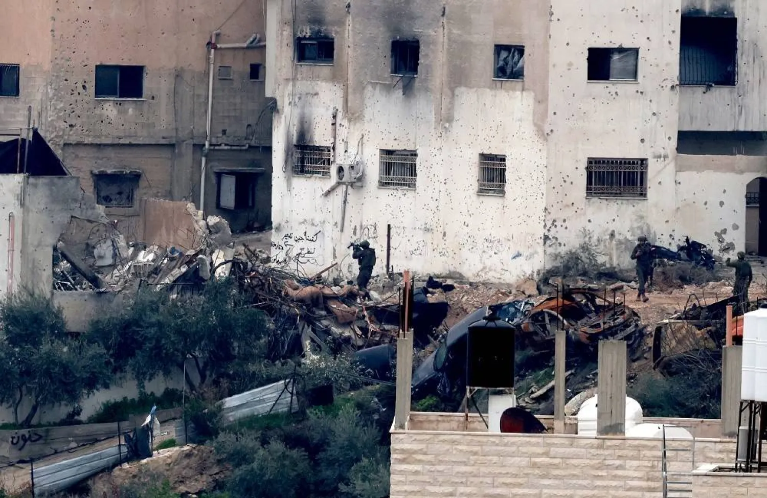 Israeli soldiers inside Jenin refugee camp on the 14th day of an Israeli military operation in the West Bank city of Jenin, 03 February 2025. (EPA)