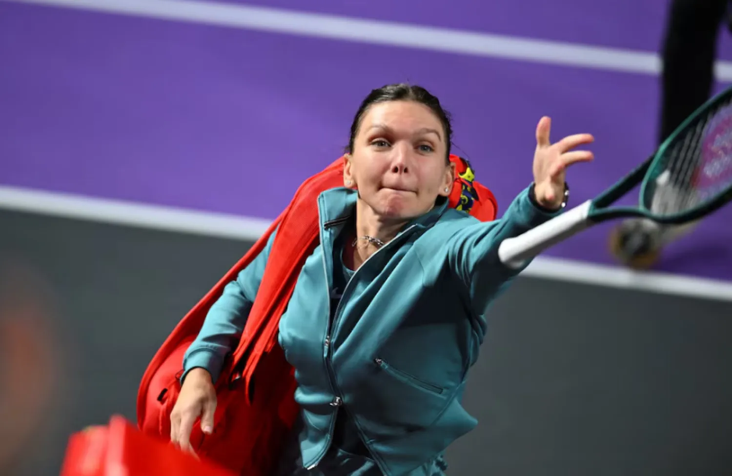Simona Halep throws her racket to fans at the end of a match during Transylvania Open in Cluj-Napoca, Romania, February 4, 2024. Inquam Photos/Alex Nicodim via REUTERS 