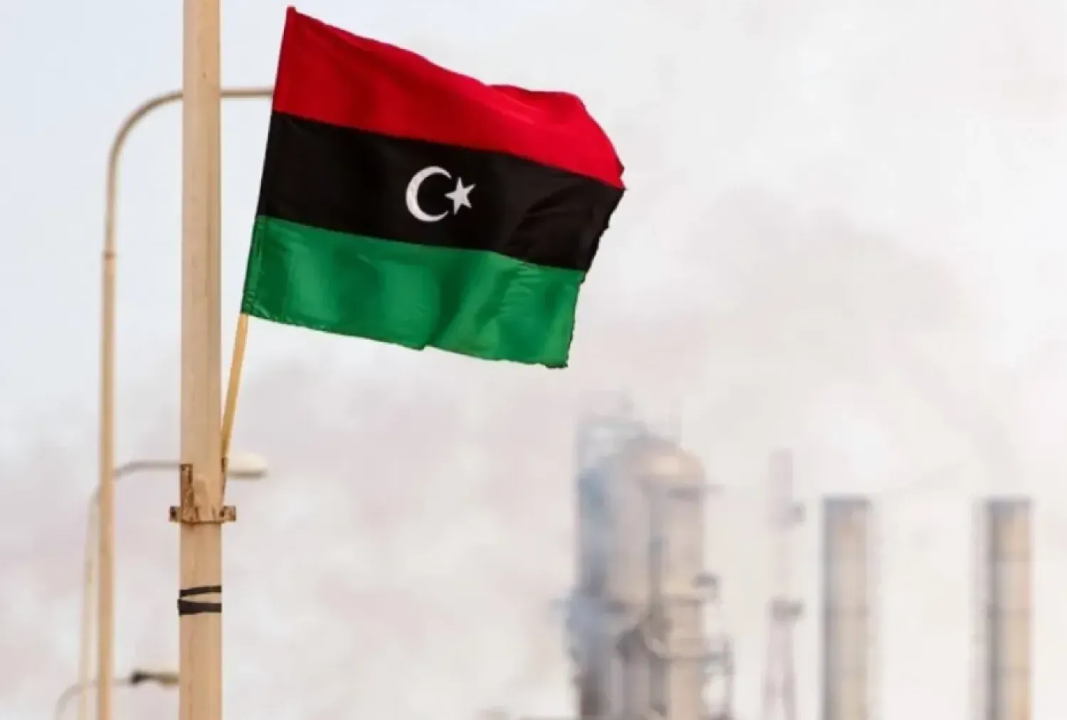 A Libyan flag is seen outside an oil refinery in Zawiya on Sept. 23, 2011. (AFP/Getty Images)
