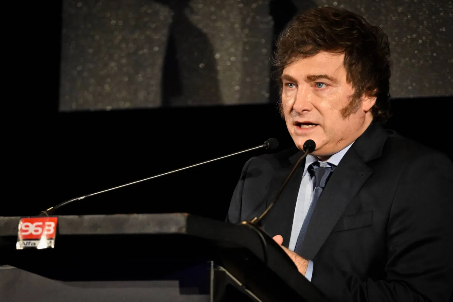 FILED - 06 December 2024, Uruguay, Montevideo: Argentina's President Javier Milei gives a speech on stage at the Uruguayan Association of Marketing Executives (ADM). Photo: Santiago Mazzarovich/dpa