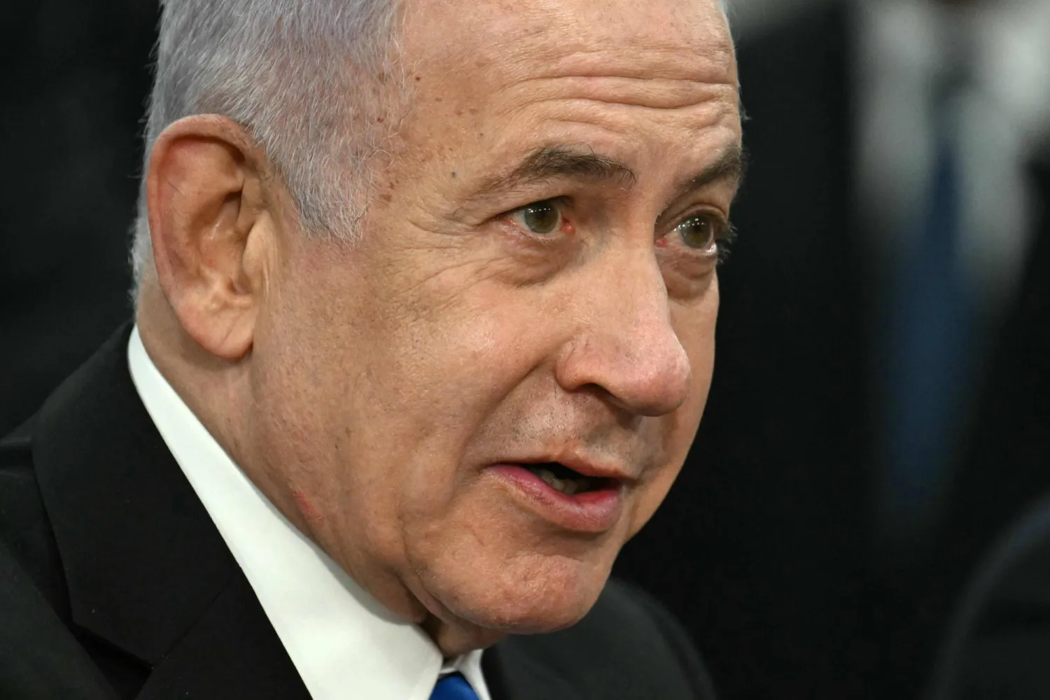 Israeli Prime Minister Benjamin Netanyahu speaks during a meeting with US Secretary of Defense Pete Hegseth (out of frame) at the Pentagon in Arlington, Virginia, on February 5, 2025. (Photo by Jim WATSON / AFP)