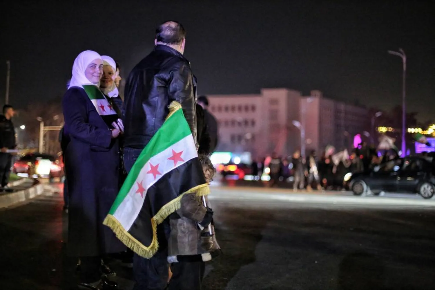 People celebrate in the streets after Syrian leader Ahmed al-Sharaa was named president to oversee a transitional period in Damascus, Syria, 29 January 2025. (EPA)