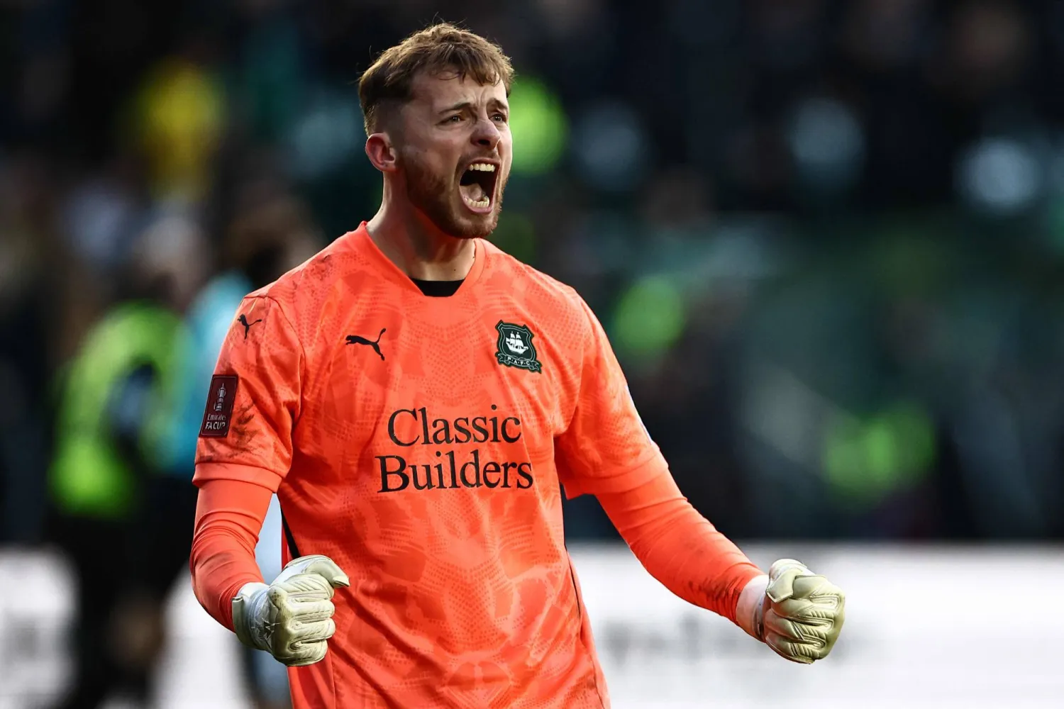 Plymouth's Northern Irish goalkeeper #21 Conor Hazard celebrates after wining the English FA Cup fourth round football match between Plymouth Argyle and Liverpool at Home Park in Plymouth, south west England, on February 9, 2025. Plymouth won the match 1-0. (Photo by HENRY NICHOLLS / AFP)
