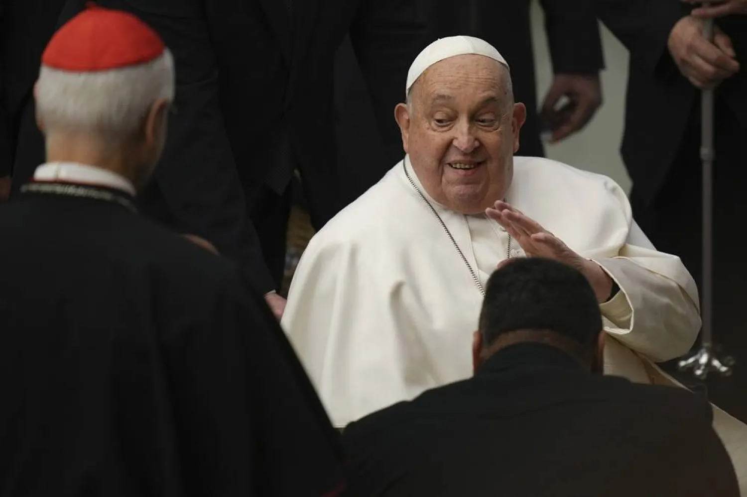  Pope Francis salutes faithful during his weekly general audience in the Paul VI Hall, at the Vatican, Wednesday, Feb. 12, 2025. (AP) 