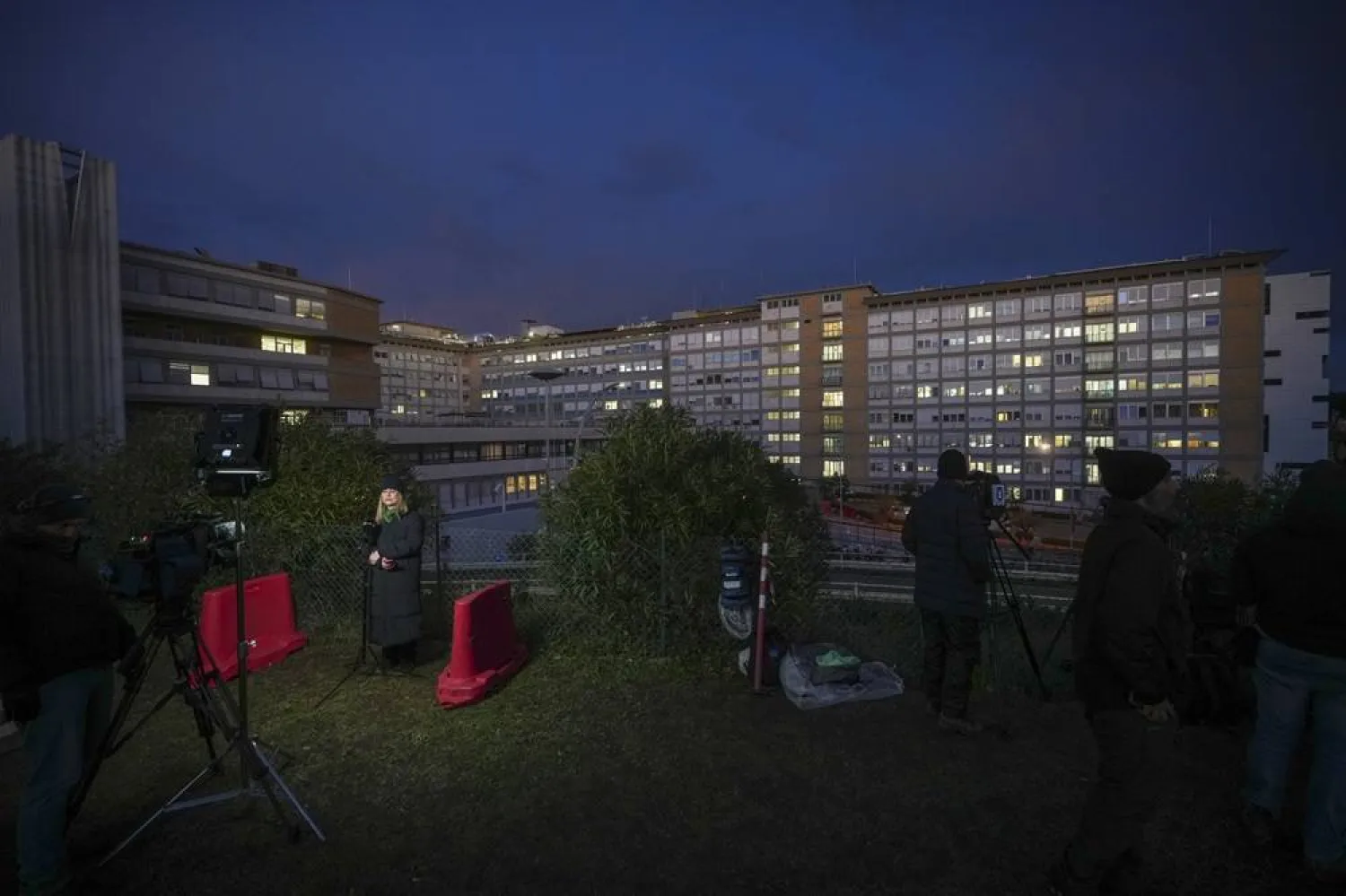  Journalists wait outside the Agostino Gemelli Polyclinic in Rome, Saturday, Feb. 15, 2025, where Pope Francis was hospitalized Friday after a weeklong bout of bronchitis worsened and is receiving drug therapy for a respiratory tract infection. (AP) 