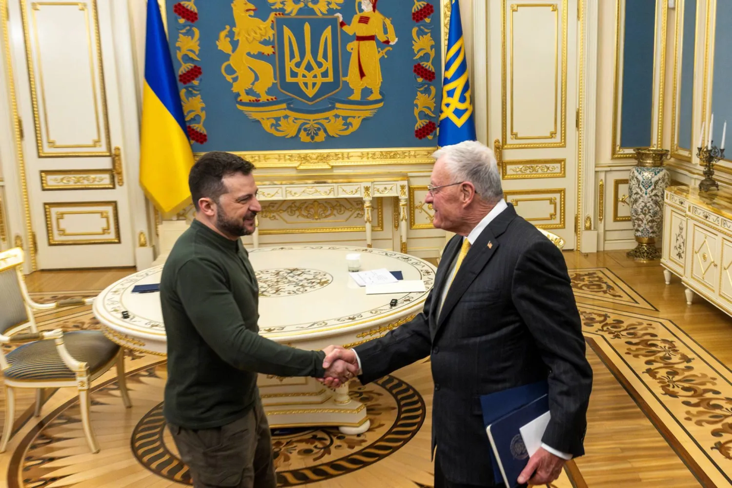 US Special Envoy to Ukraine and Russia Keith Kellogg shakes hands with Ukrainian President Volodymyr Zelenskiy, amid Russia's attack on Ukraine, in Kyiv, Ukraine, February 20, 2025. REUTERS/Thomas Peter