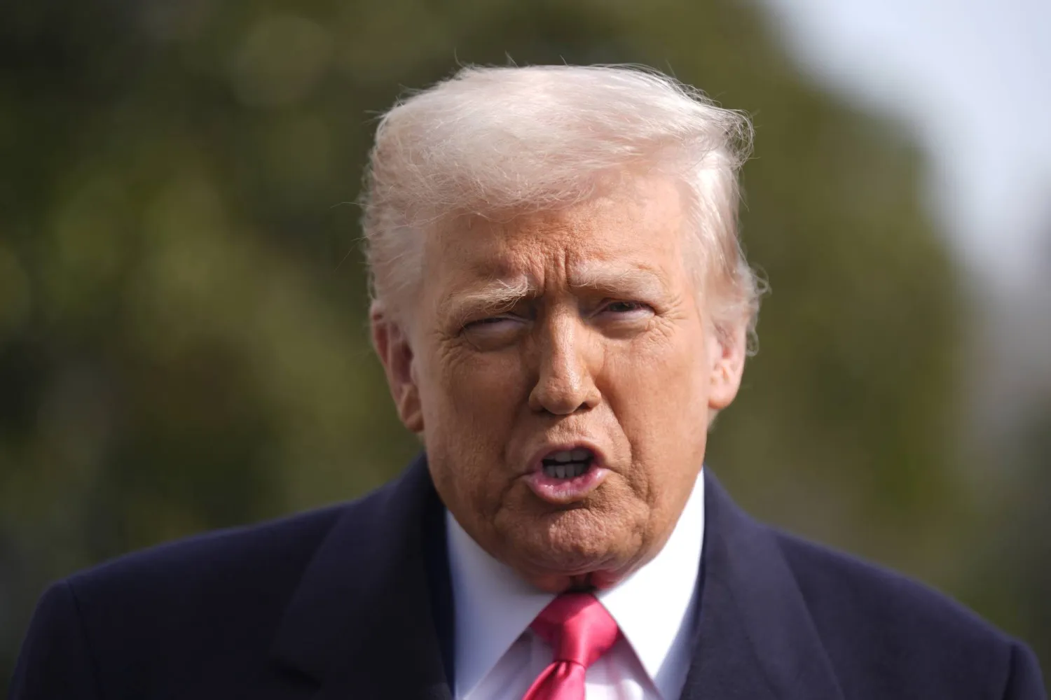 President Donald Trump speaks to reporters before departing the White House in Washington, Saturday, Feb. 22, 2025. (AP Photo/Manuel Balce Ceneta)