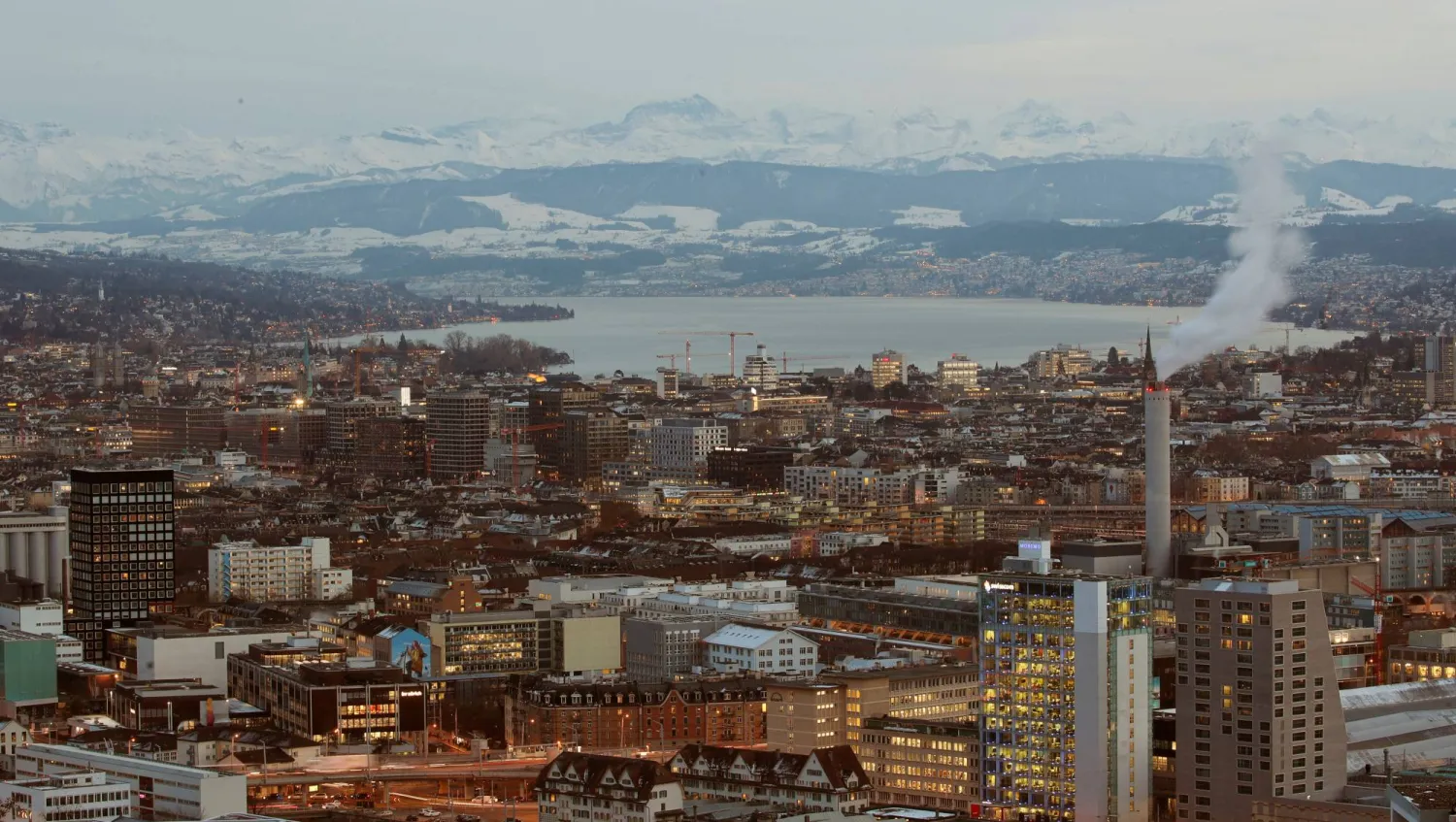FILE PHOTO: A general view shows the eastern Swiss Alps, Lake Zurich and the city of Zurich, Switzerland January 29, 2019. REUTERS/Arnd Wiegmann/File Photo