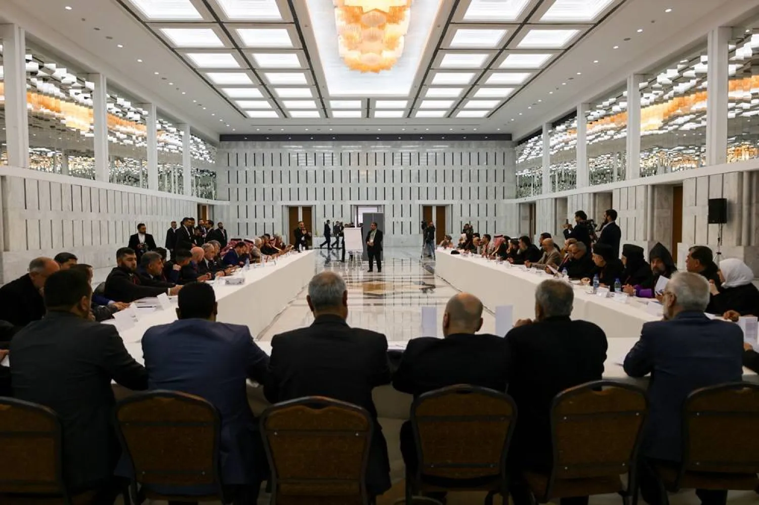 Attendees take part in a national dialogue, a key milestone in the transition to a new political system after decades of Assad rule, in Damascus, Syria February 25, 2025. (Reuters)