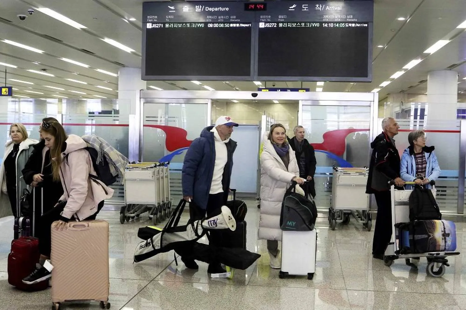 A group of Russian tourists, likely the first foreign travelers from any country to enter North Korea since the pandemic arrive at the Pyongyang International Airport in Pyongyang, North Korea, on Feb. 9, 2024. (AP)