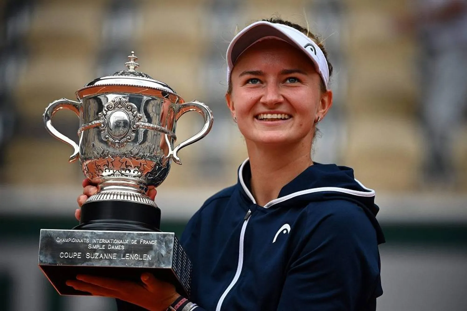 Czech Republic's Barbora Krejcikova celebrates with the trophy after winning the French Open women's singles title against Russia's Anastasia Pavlyuchenkova, Paris, France, June 12, 2021. (AFP) 