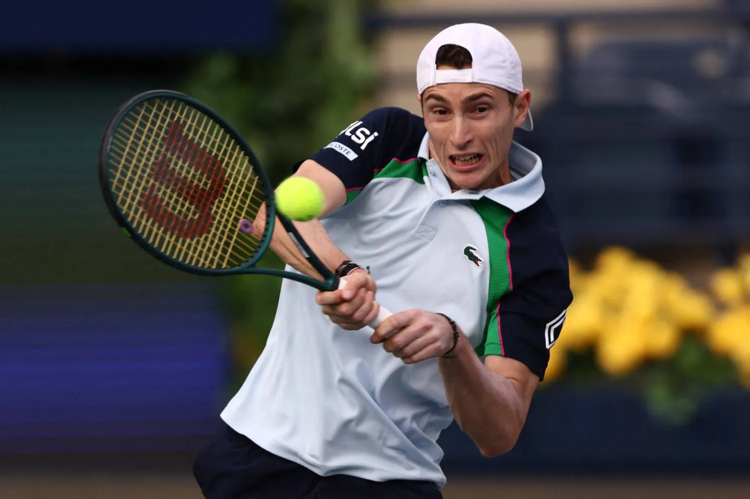 ودع الفرنسي أوغو أومبير حامل لقب دورة دبي البطولة مبكراً (رويترز)