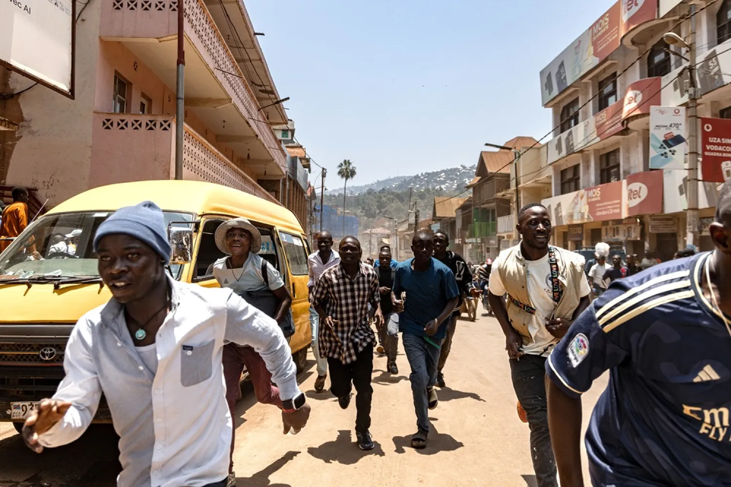 People run away from the site of a bomb blast in Bukavu, South Kivu province, Democratic Republic of Congo, 27 February 2025. (EPA)