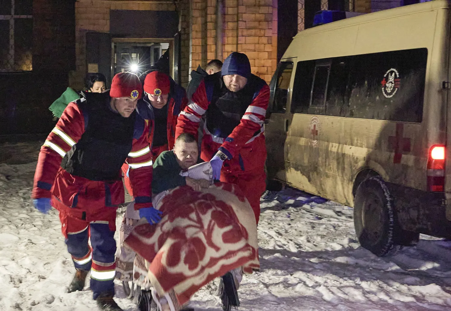 Ukrainian rescuers evacuate patients from a damaged clinic following a drone attack in Kharkiv, Ukraine, 01 March 2025, amid the ongoing Russian invasion. EPA/SERGEY KOZLOV