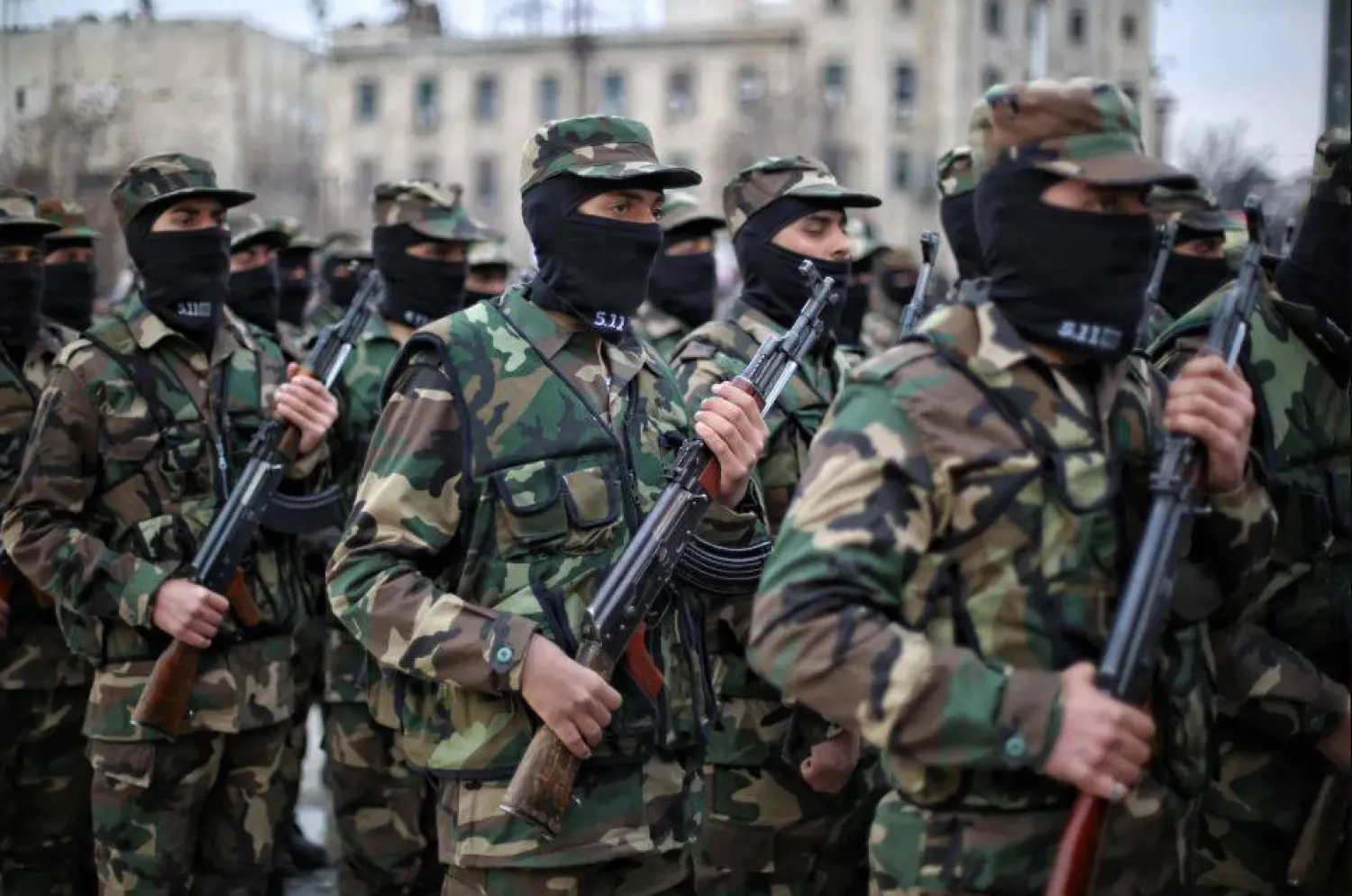 جنود سوريون يشاركون في عرض عسكري (أرشيفية - إ.ب.أ)