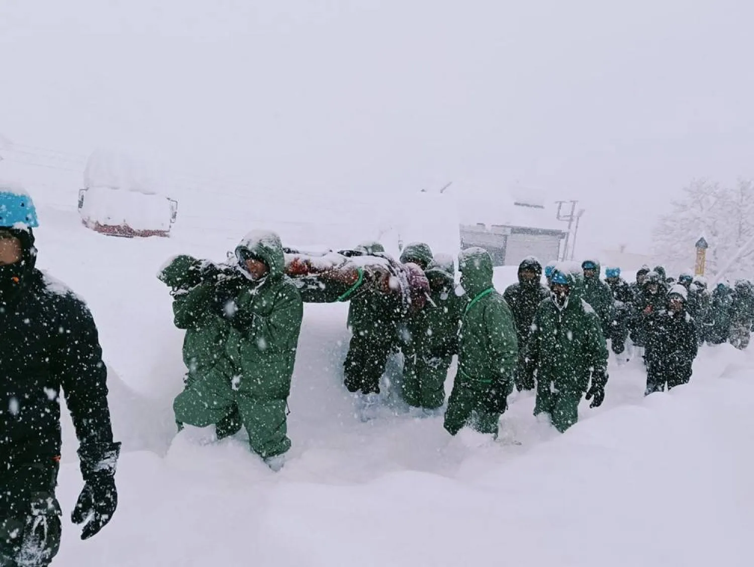 A still image shows what the Indian Army says is a rescue operation by Indian Army members during heavy snowfall, after an avalanche struck a camp near Mana village, in a location given as Garhwal Sector, Uttarakhand state, India, in this image released on February 28, 2025. (Indian Army/Handout via Reuters)