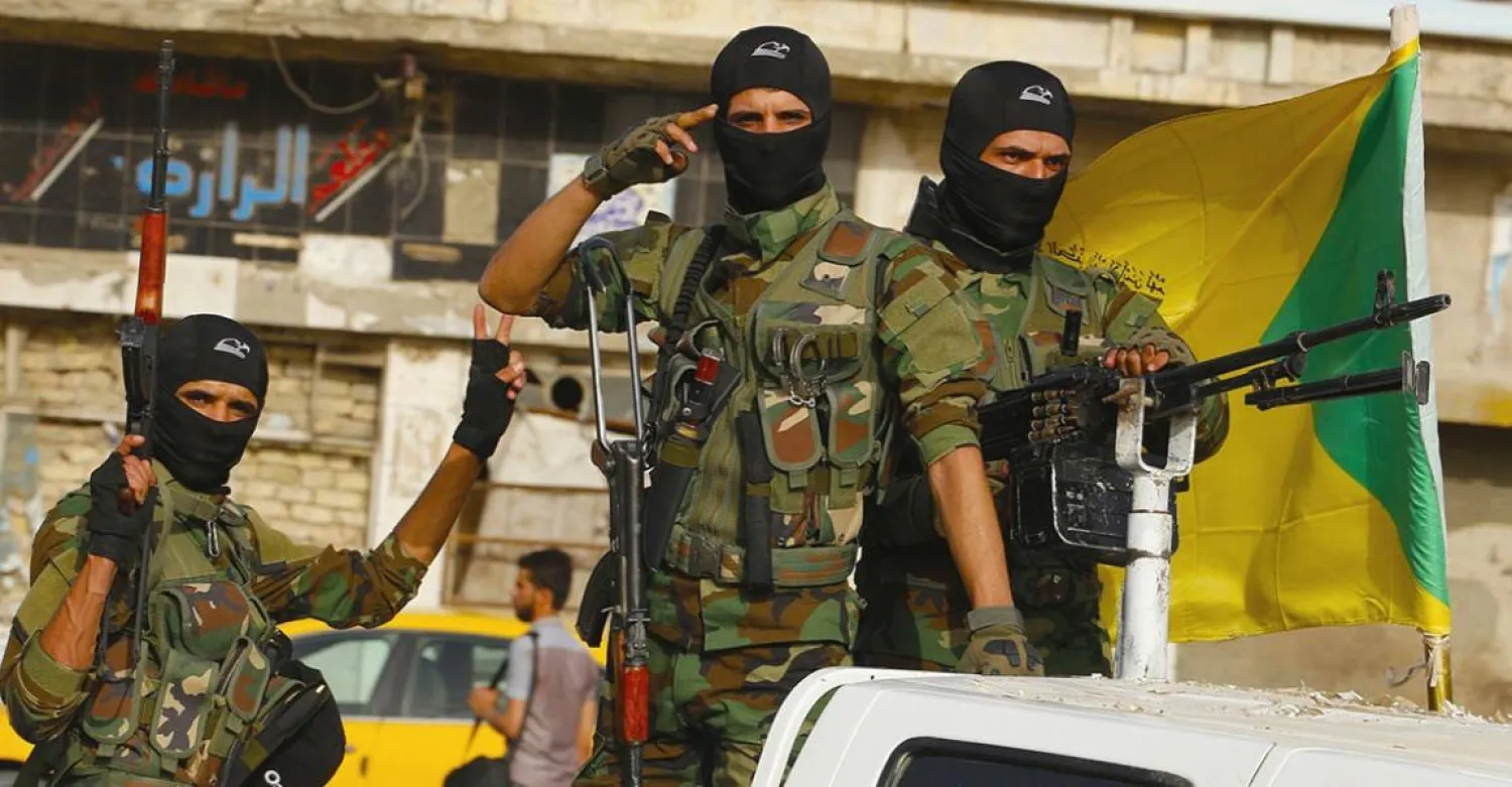 أعضاء «كتائب حزب الله» العراقية خلال استعراض عسكري (إكس)