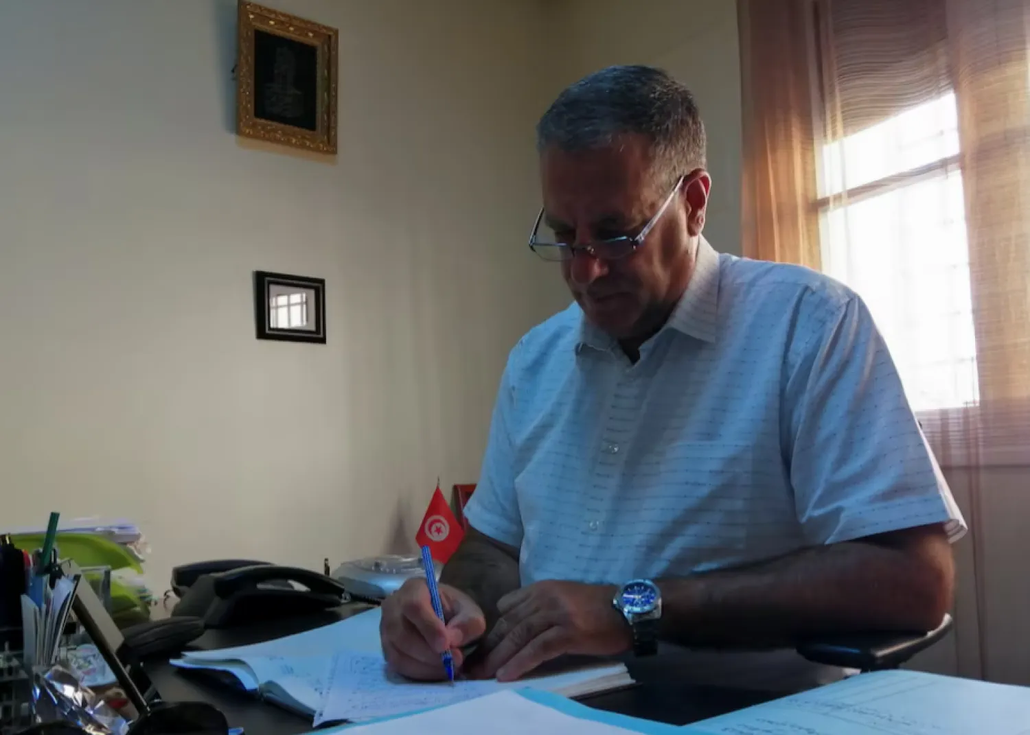 Secretary general of Attayar party, Ghazi Chaouachi, attends an interview with Reuters in Tunis, Tunisia September 23, 2021. REUTERS/Jihed Abidellaoui/File Photo